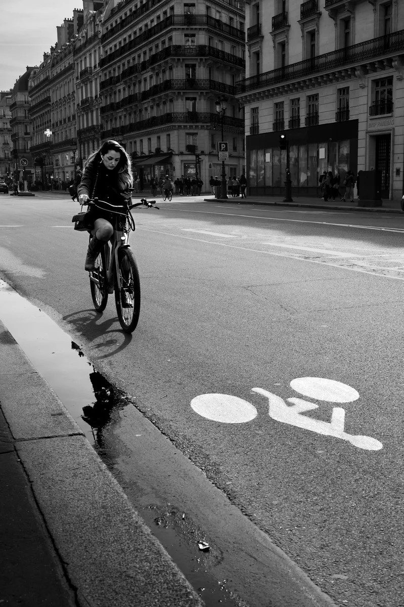 Photograph “GIRL ON A BICYCLE”, Paris, France (March 2024).
